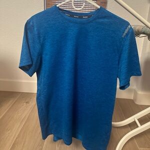 Bright blue reebok athletic t shirt
